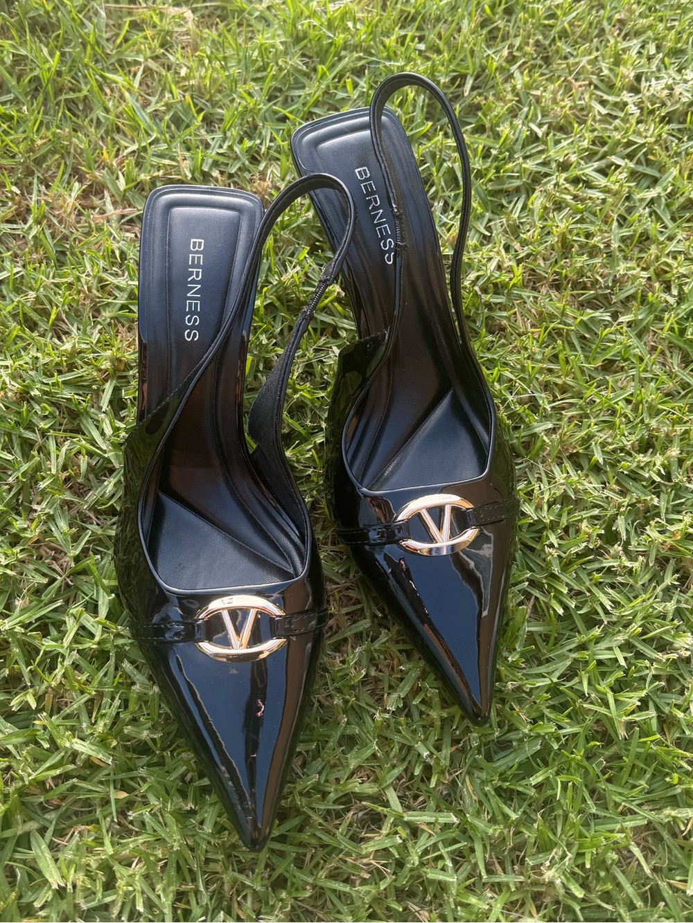 Patent Pointed-Toe Pumps with Gold Emblem